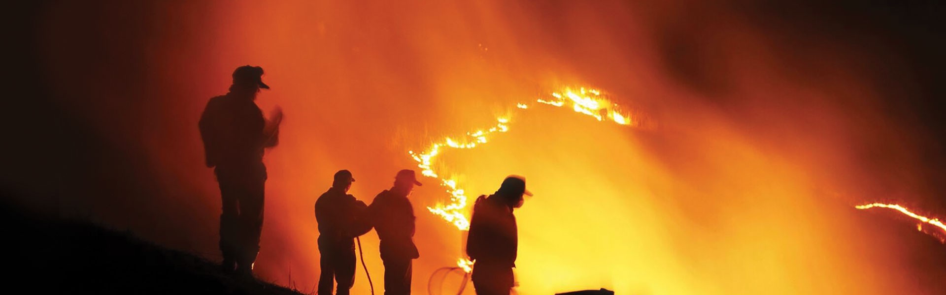 Firemen fighting flames.